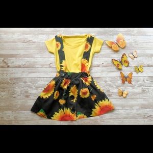 Sunflower suspender dress.